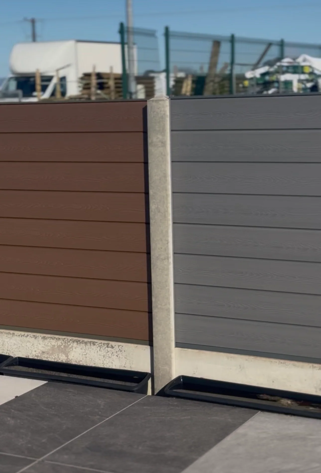 Composite fencing panels in two tones