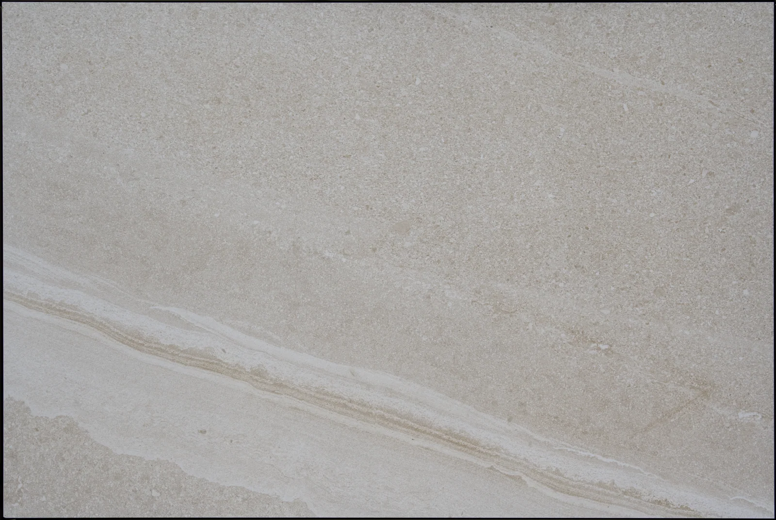 Cutstone Sand outdoor porcelain tile, pale sand tone with linear veining