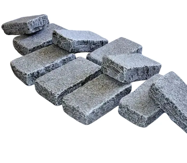 Grey Limestone setts, rough-textured silver-grey stone blocks