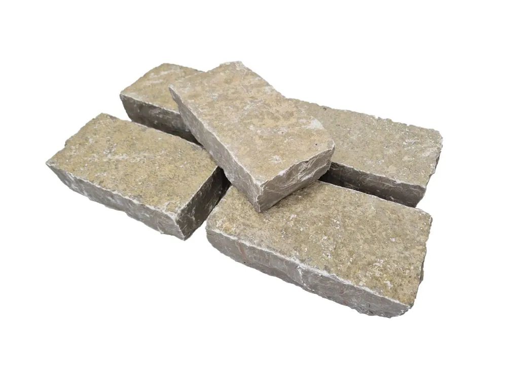 Yellow Limestone setts, warm tan tumbled stone blocks